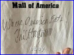 Phil Hartman Signed & Inscribed Mall of America Planet Hollywood Shirt